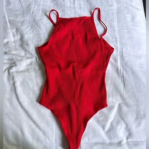 Aritzia red body suit. NWOT. Size small
